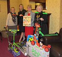 Presenting the wheel project toys to Heywood Children's Contact Centre